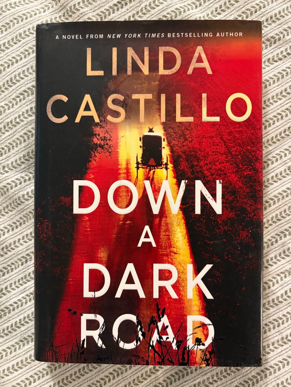 New Hardback Down a Dark Road by Linda Castillo